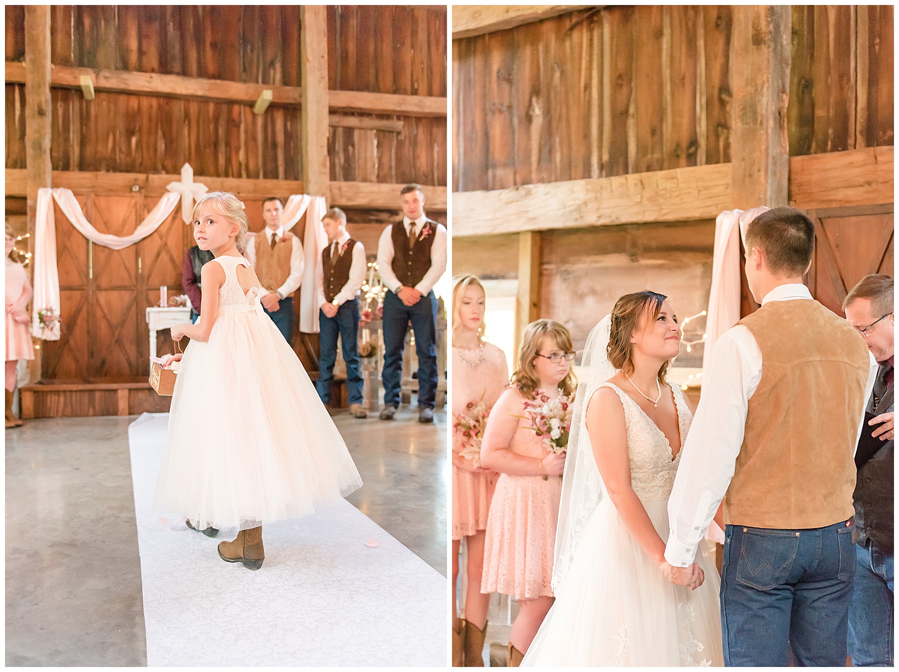 Bride smiling up at groom while holding hands in barn wedding