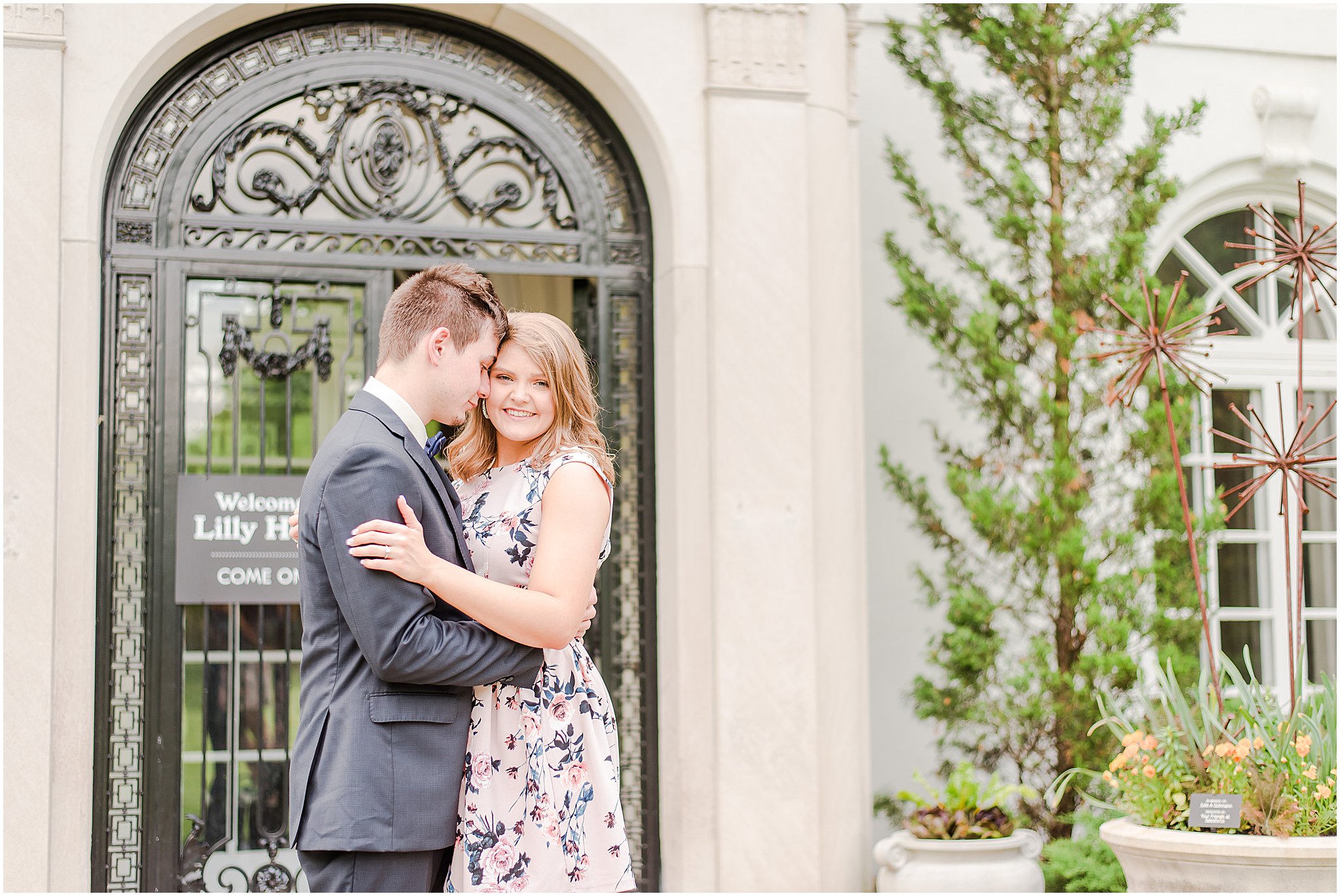 Groom nuzzling into Bride's temple during Indianapolis Museum of Art Newfields engagement session