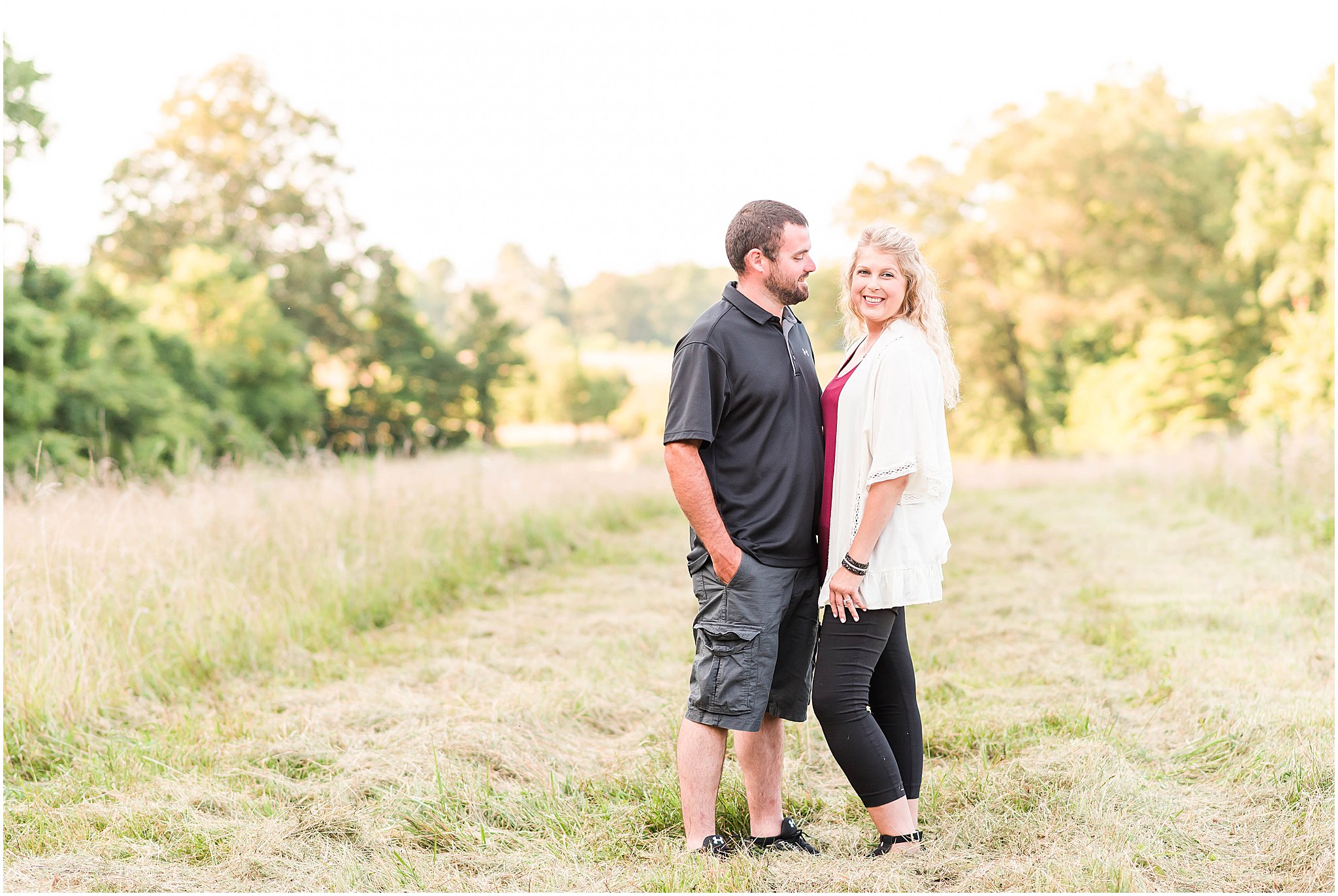 Bloomfield Indiana engagement session in field at sunset