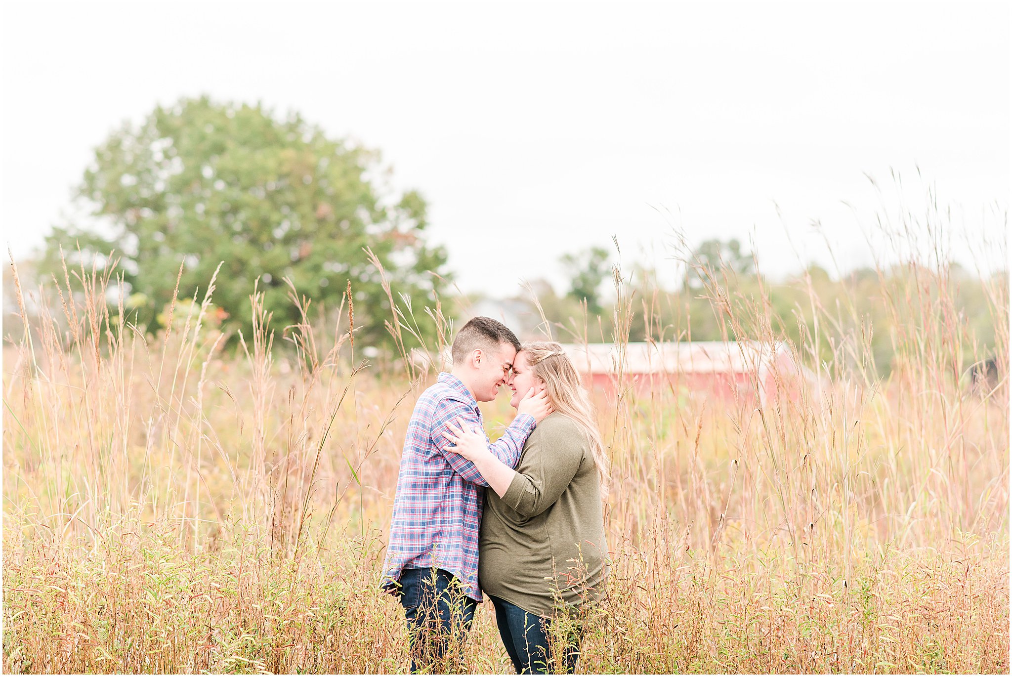 Couple nose to nose in field during Beckley Creek Park engagement session