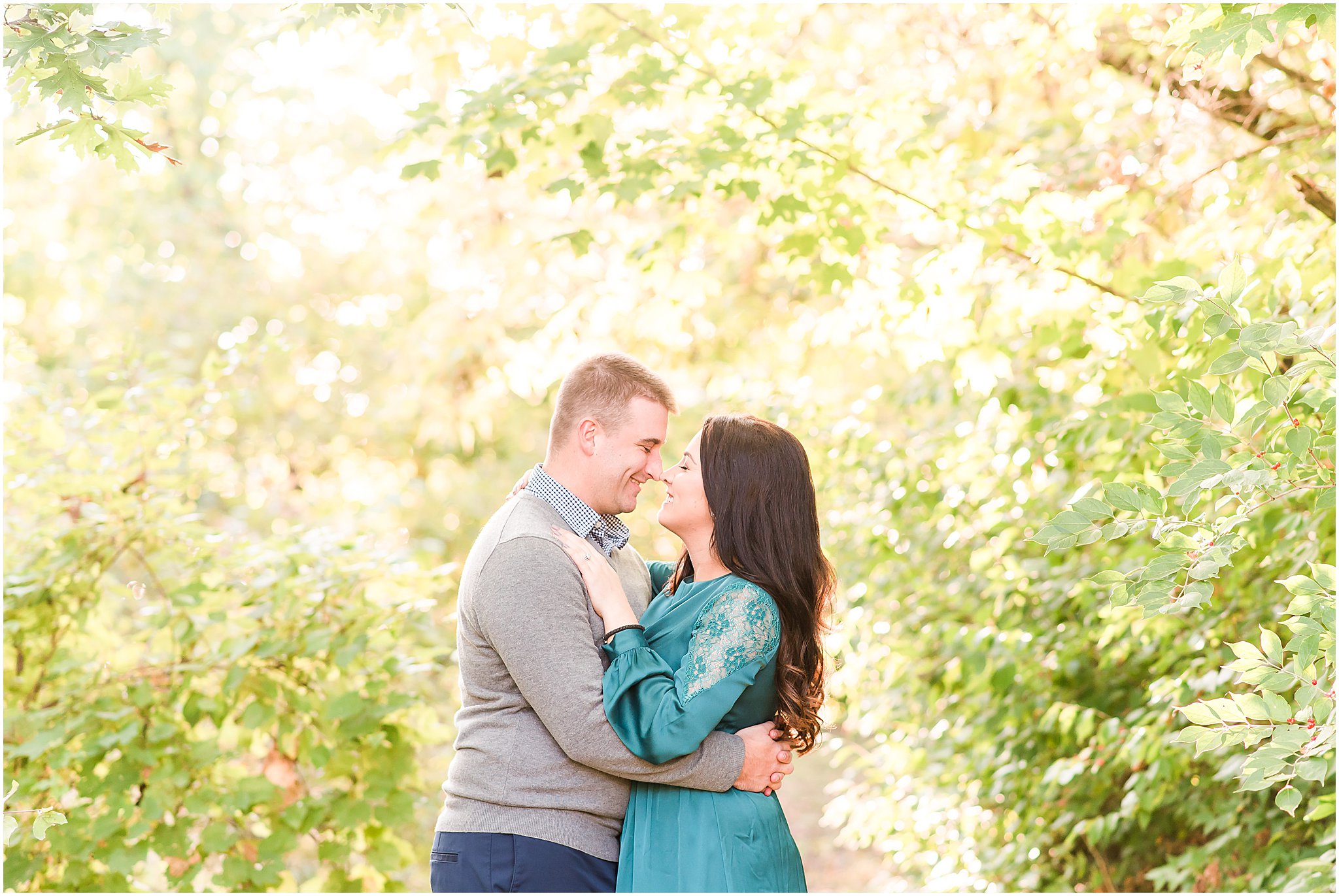 Couple nose to nose during Eagle Creek Park couples session