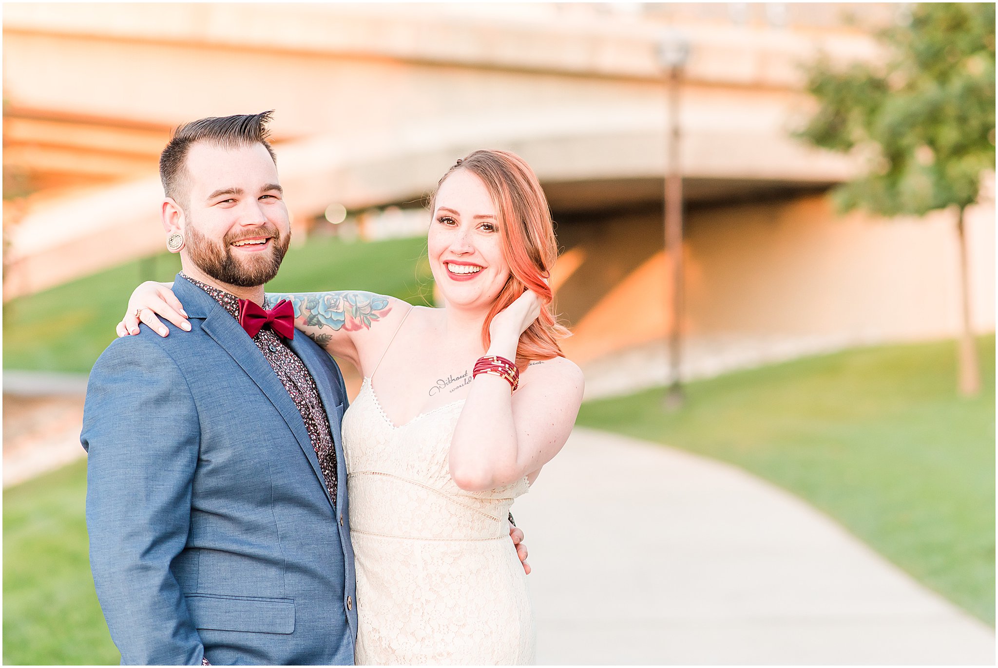 Couple hugging and laughing towards camera during Scioto Mile engagement session