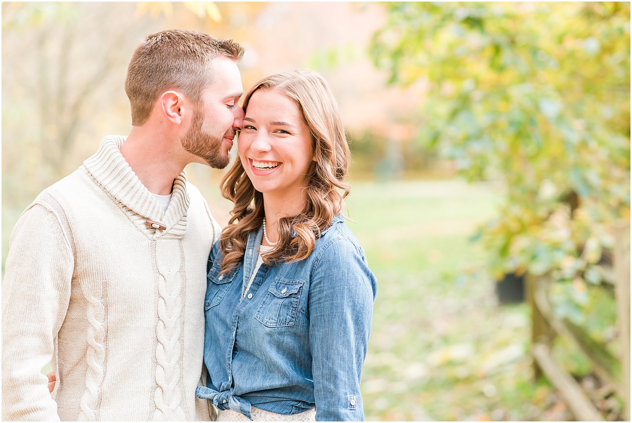Couple nuzzling during Defries Gardens engagement session