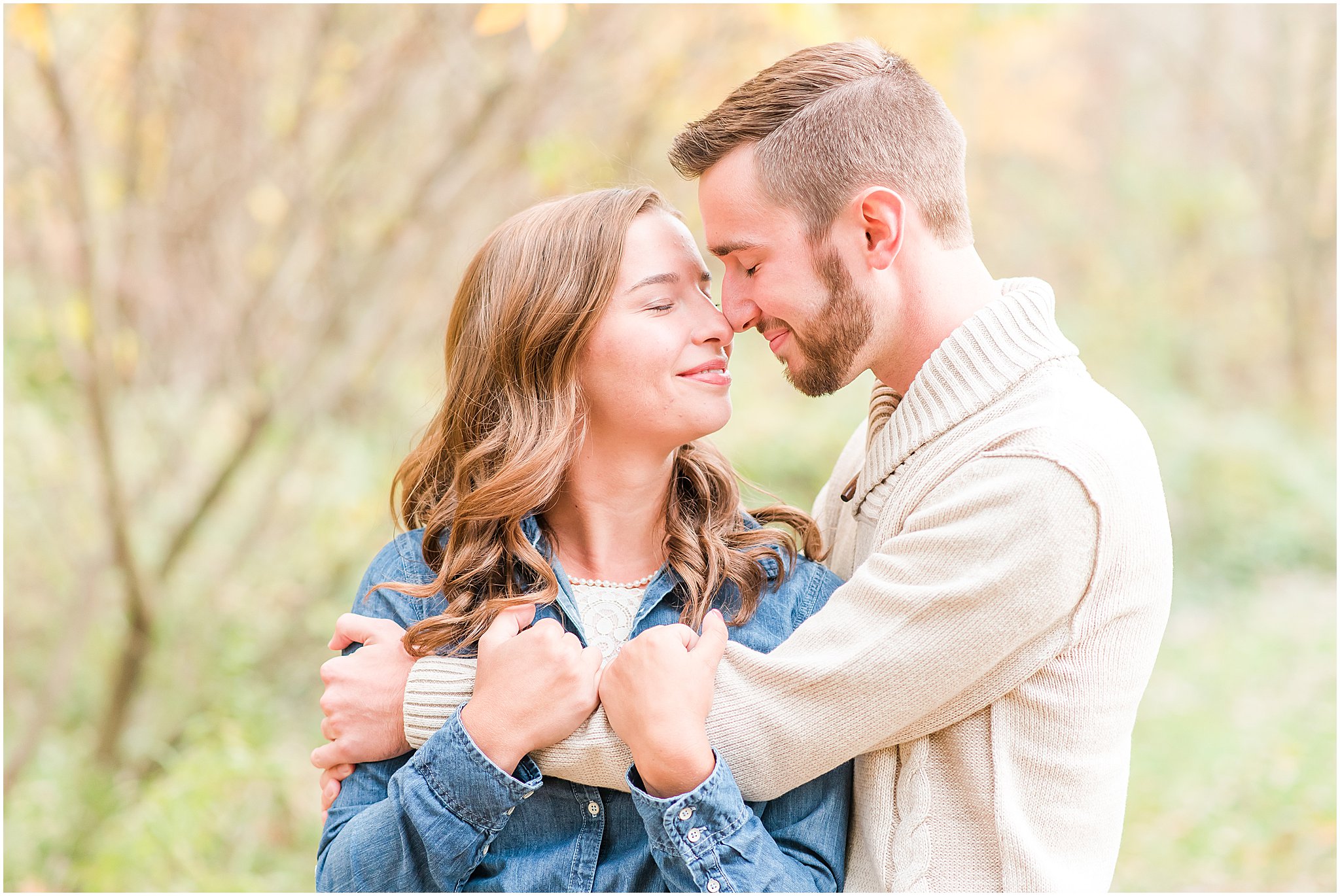 Couple nose to nose during Defries Gardens engagement session