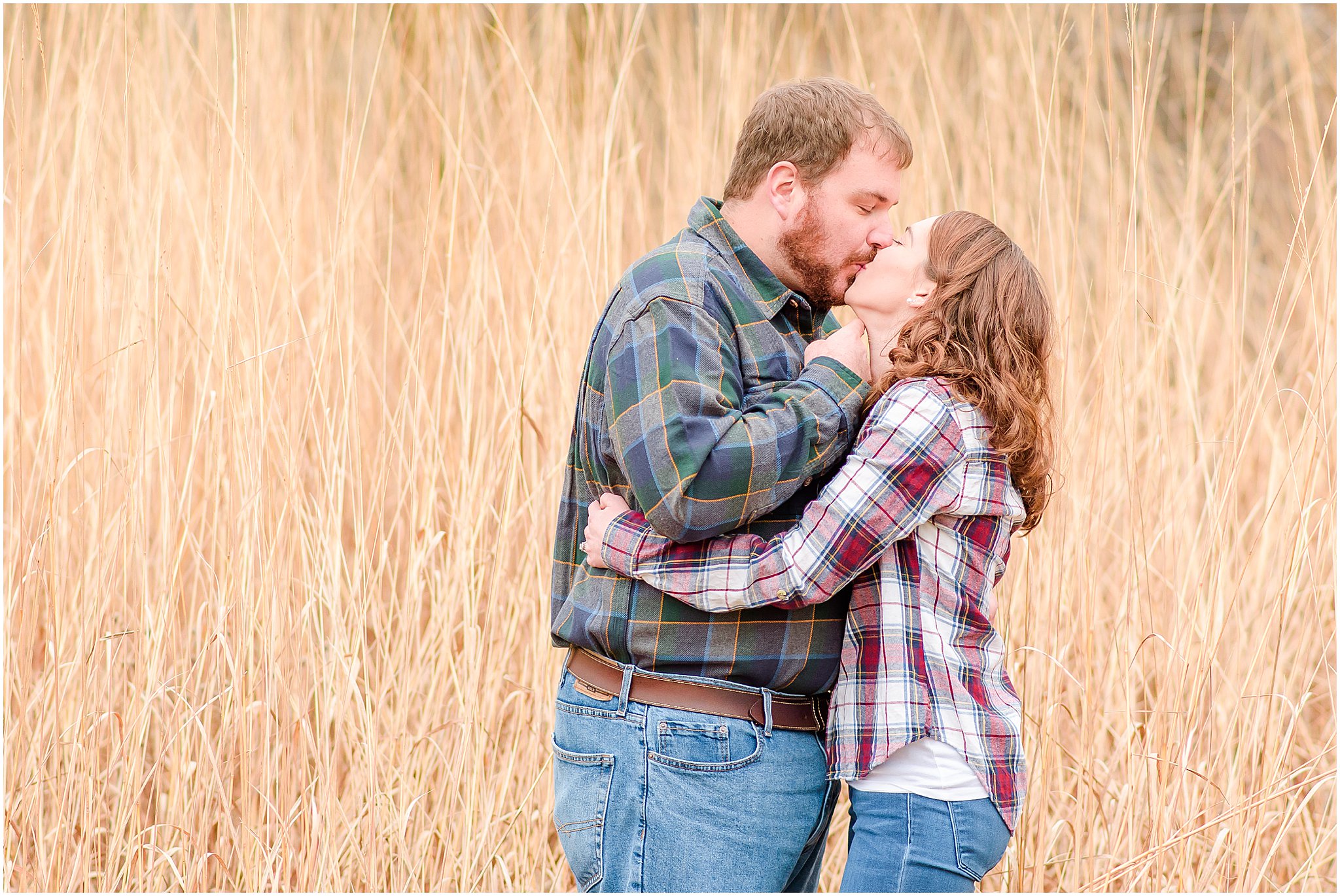 Couple kissing during Eagle Creek Park engagement session
