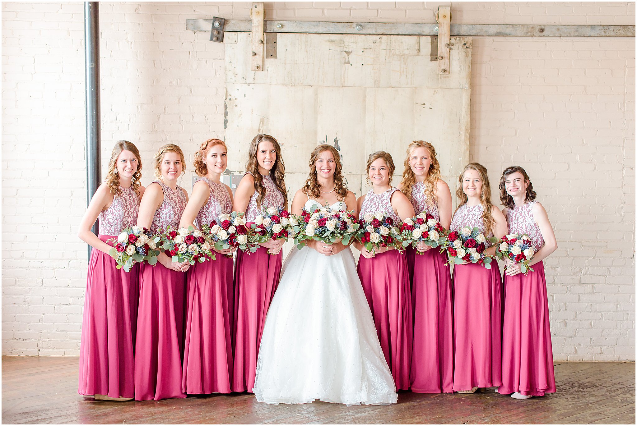 Bridesmaids in berry dresses with bride Coppes Commons Wedding