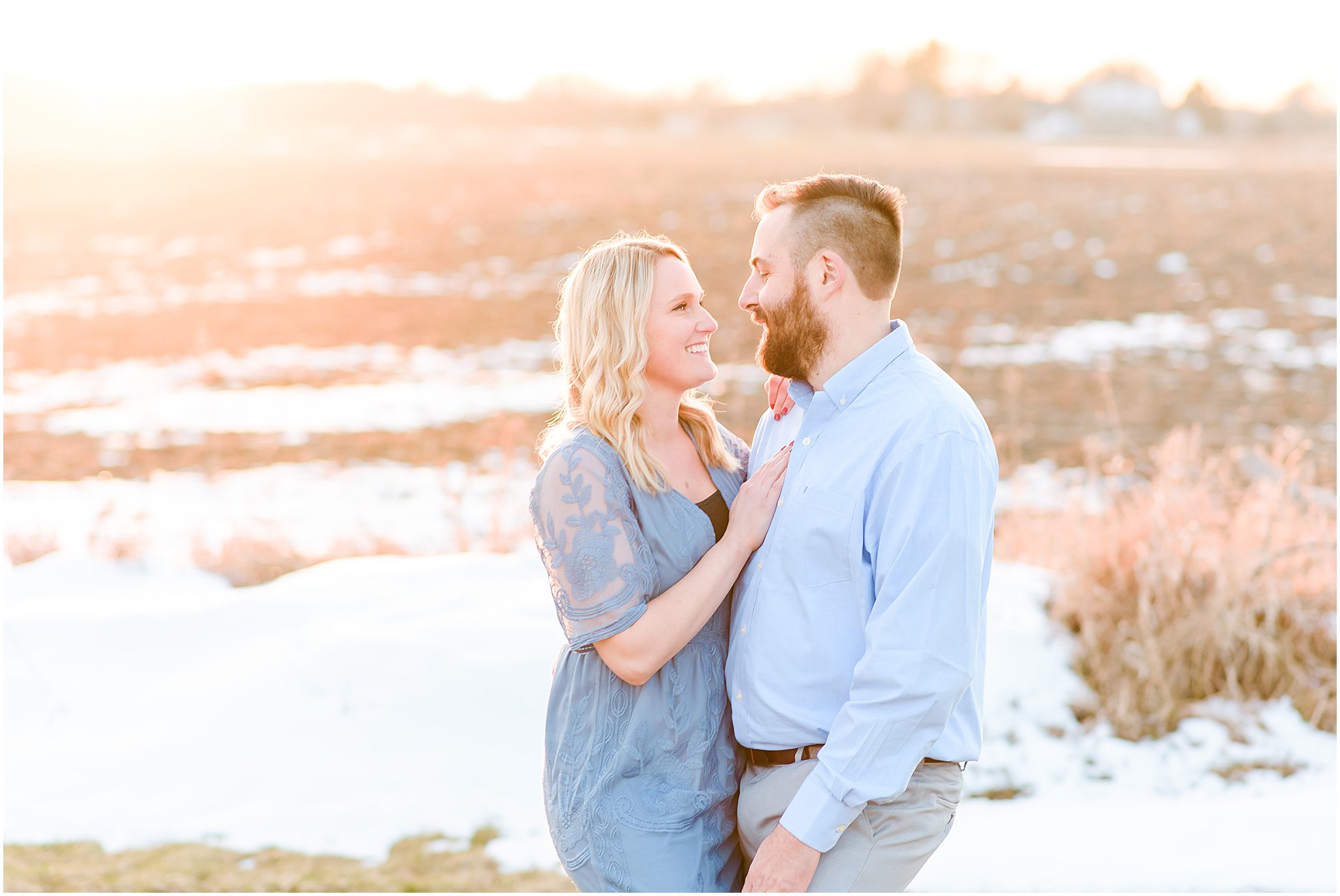 Couple smiling at each other during sunset Lizton Lodge Engagement Session