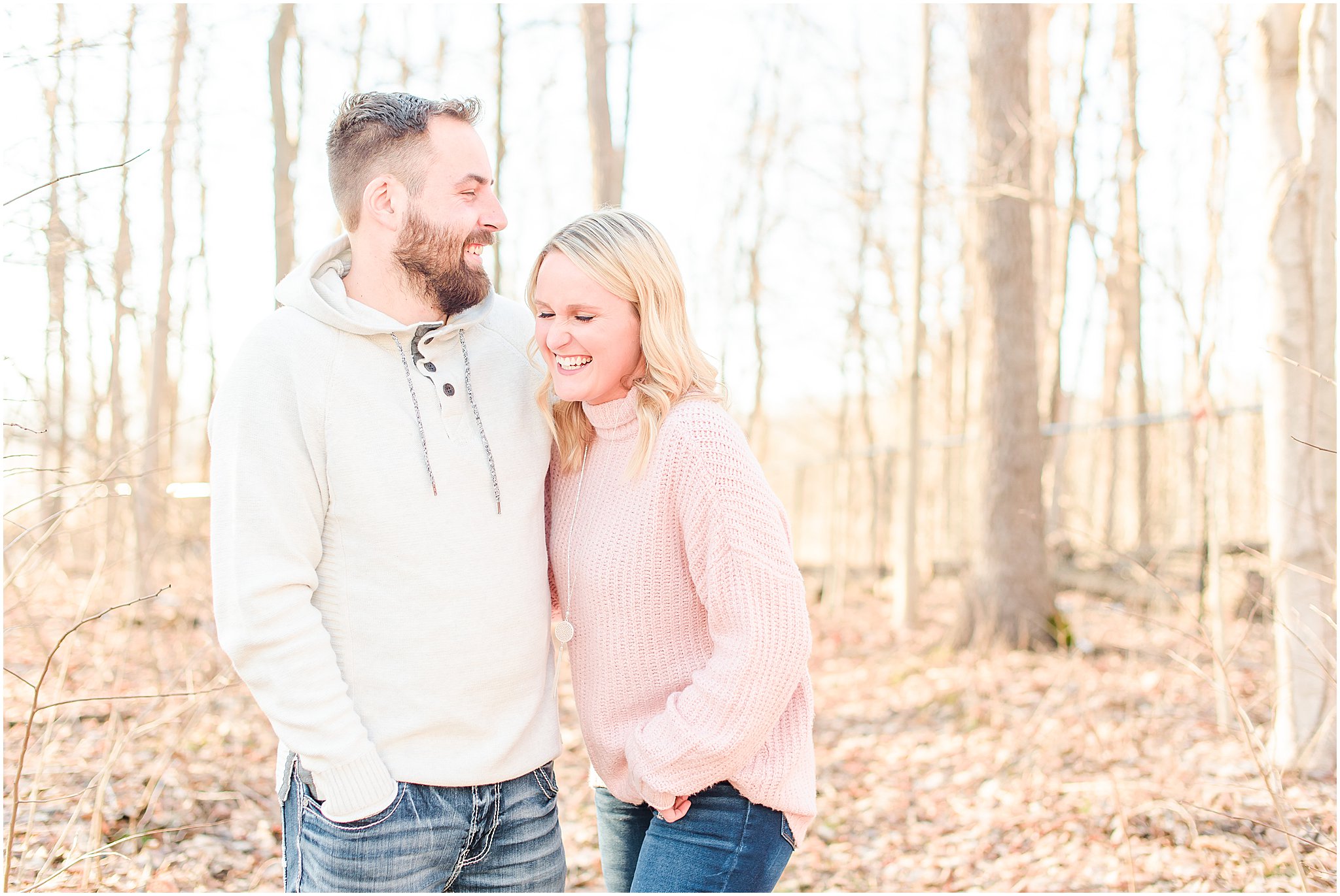 Couple snuggling and laughing together Lizton Lodge Engagement Session