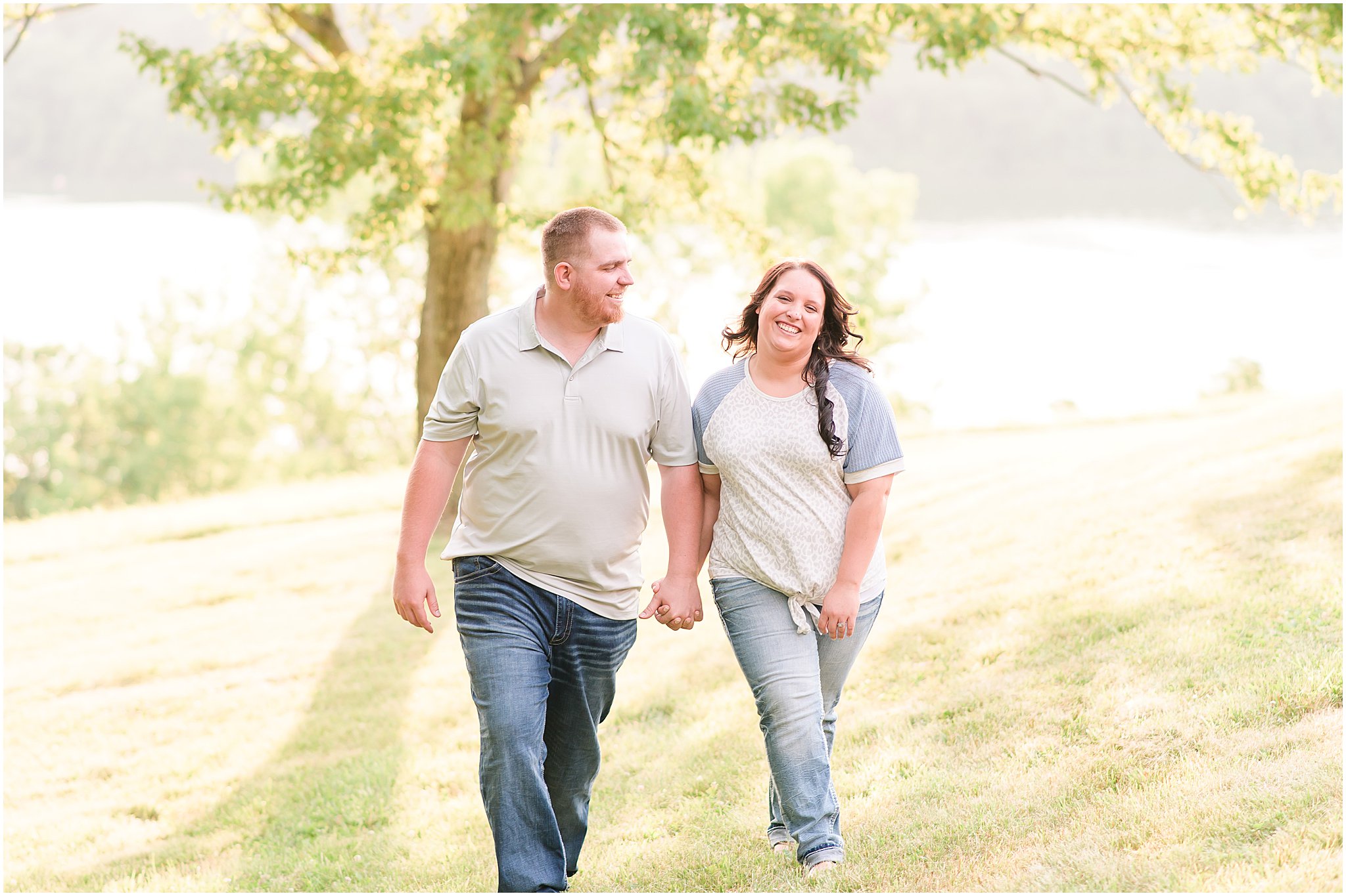 Couple laughing together during Brookville Lake engagement session
