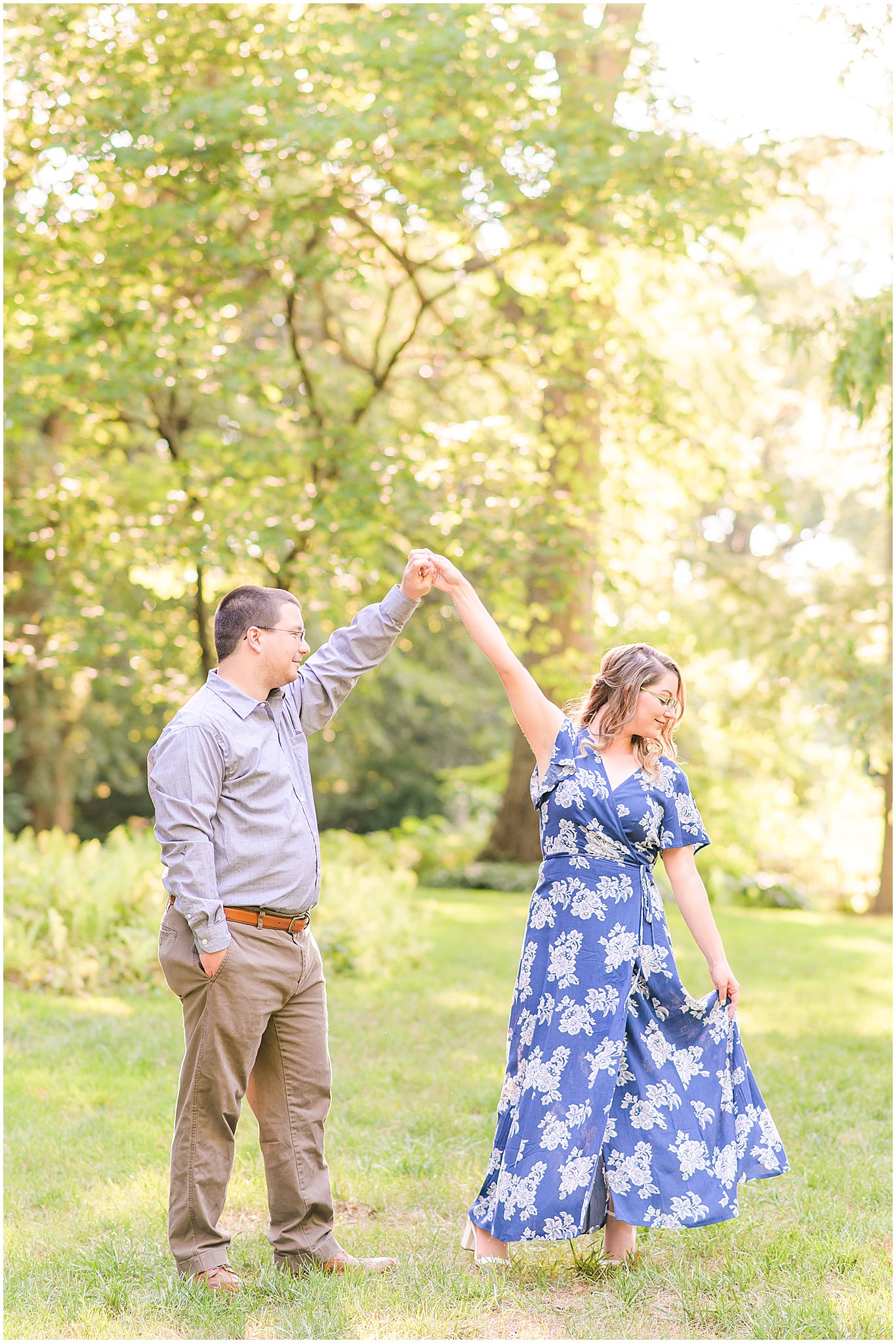 Girl twirling dress Newfields engagement session