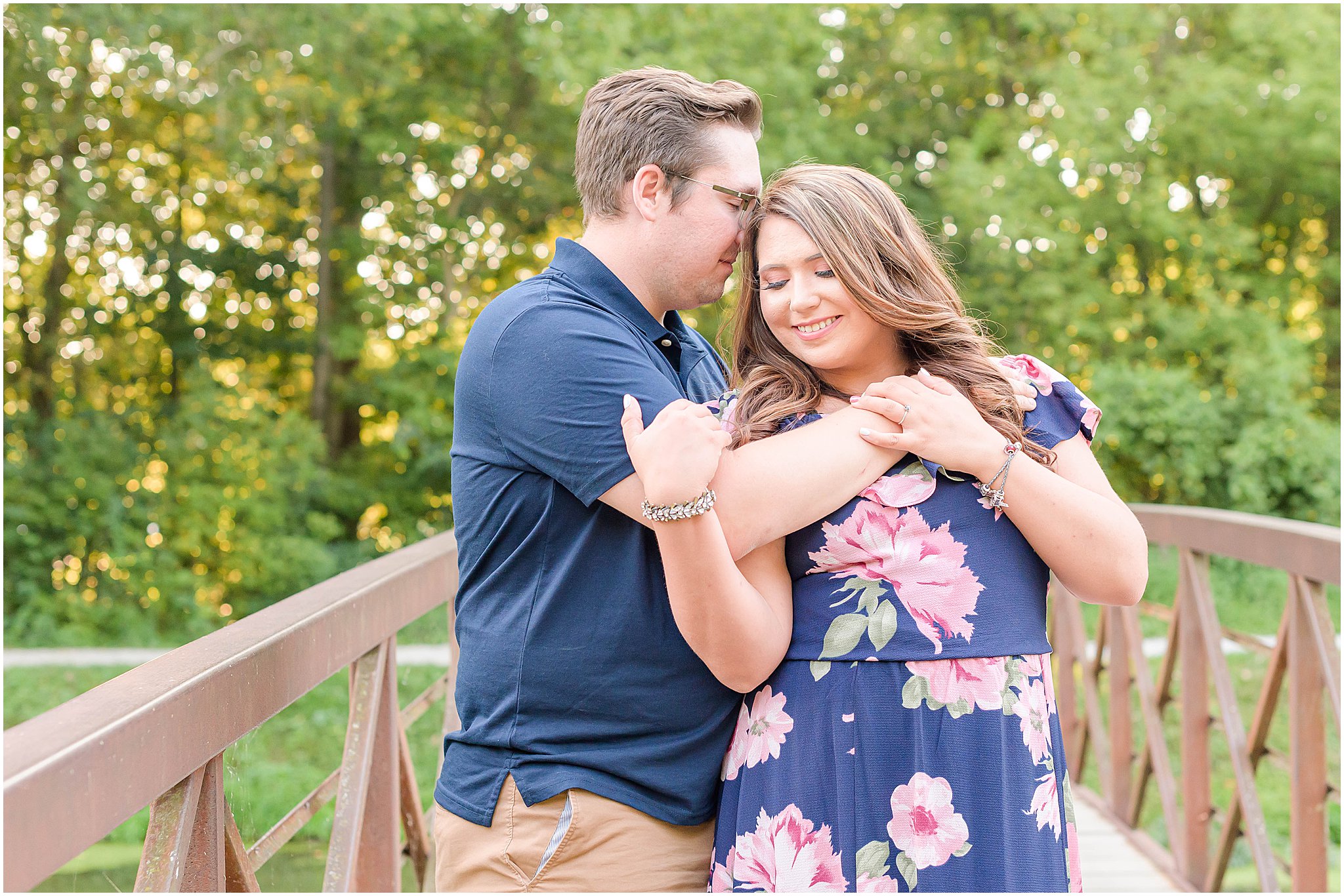 Couple nuzzling Holcomb Gardens family session