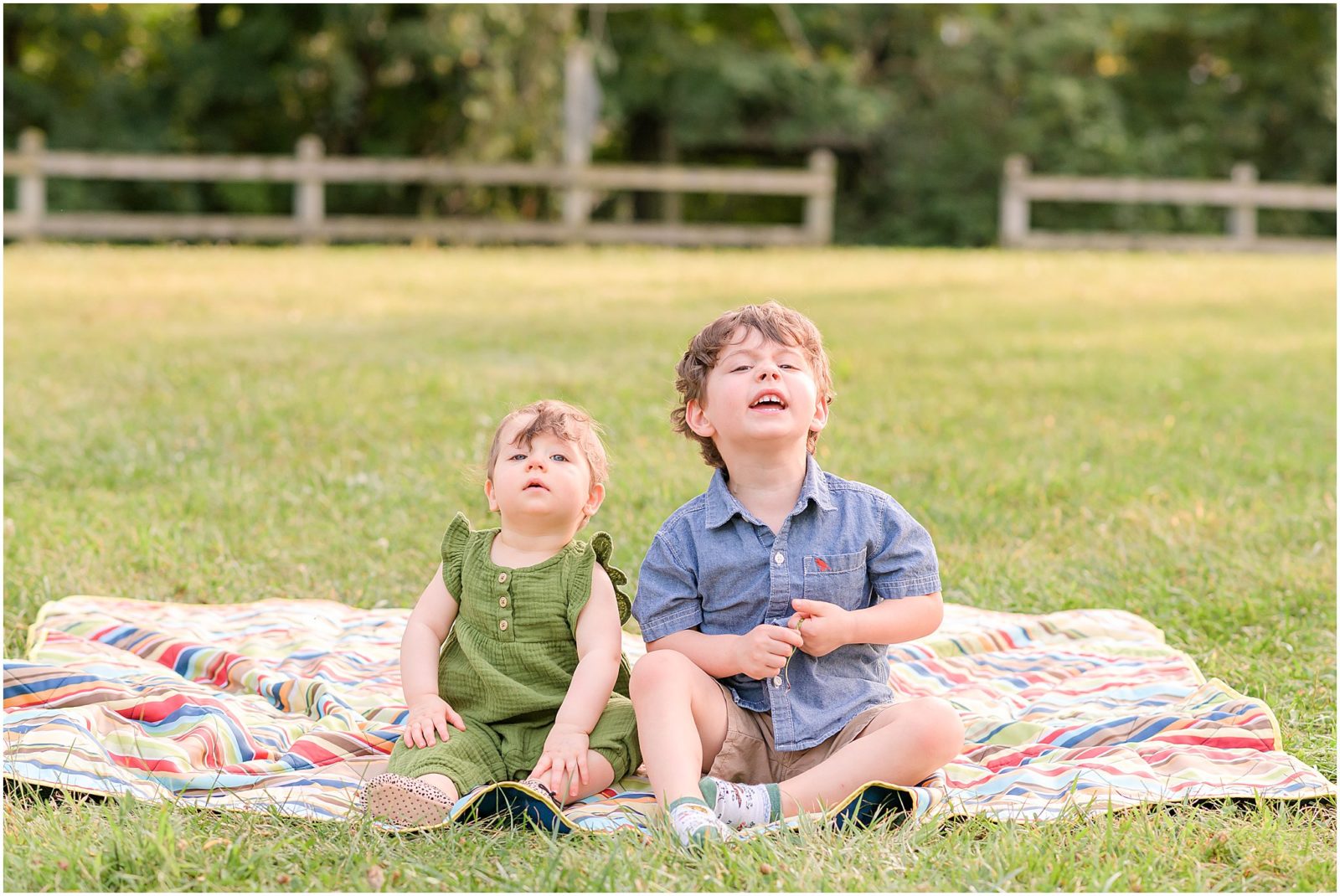 Toddlers smiling at camera Cool Creek Park family session