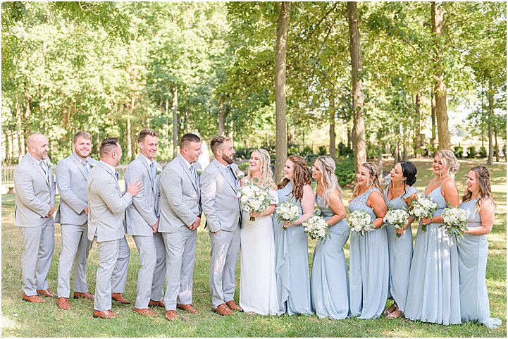 Bridal party laughing together Lizton Lodge wedding