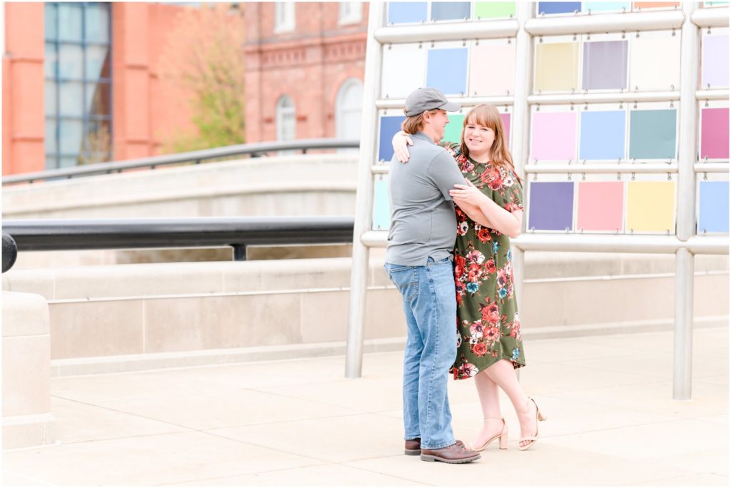 Couple chest to chest and laughing Downtown Indianapolis Canal Engagement Session