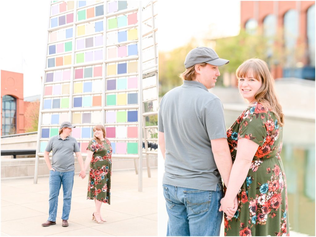 Couple laughing at each other Downtown Indianapolis Canal Engagement Session