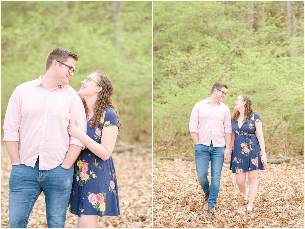 Couple smiling holding hand and walking Fowler Park engagement session