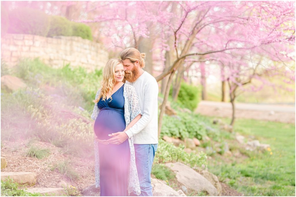 Couple cuddling as cradle baby bump Province Park Maternity Session