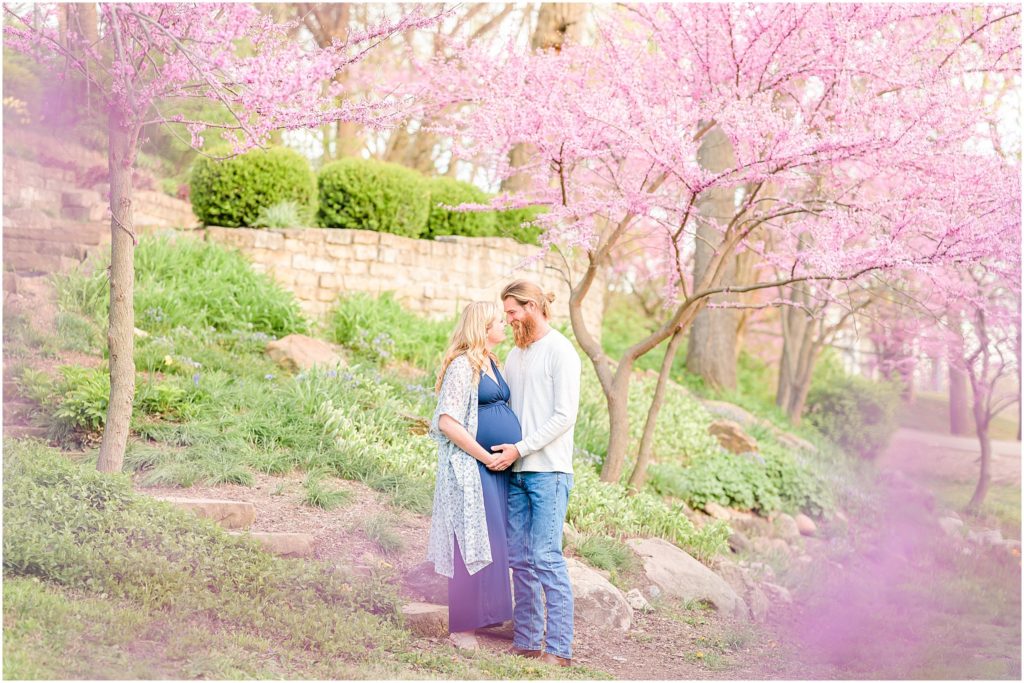 Couple nose to nose as cradle baby bump Province Park Maternity Session