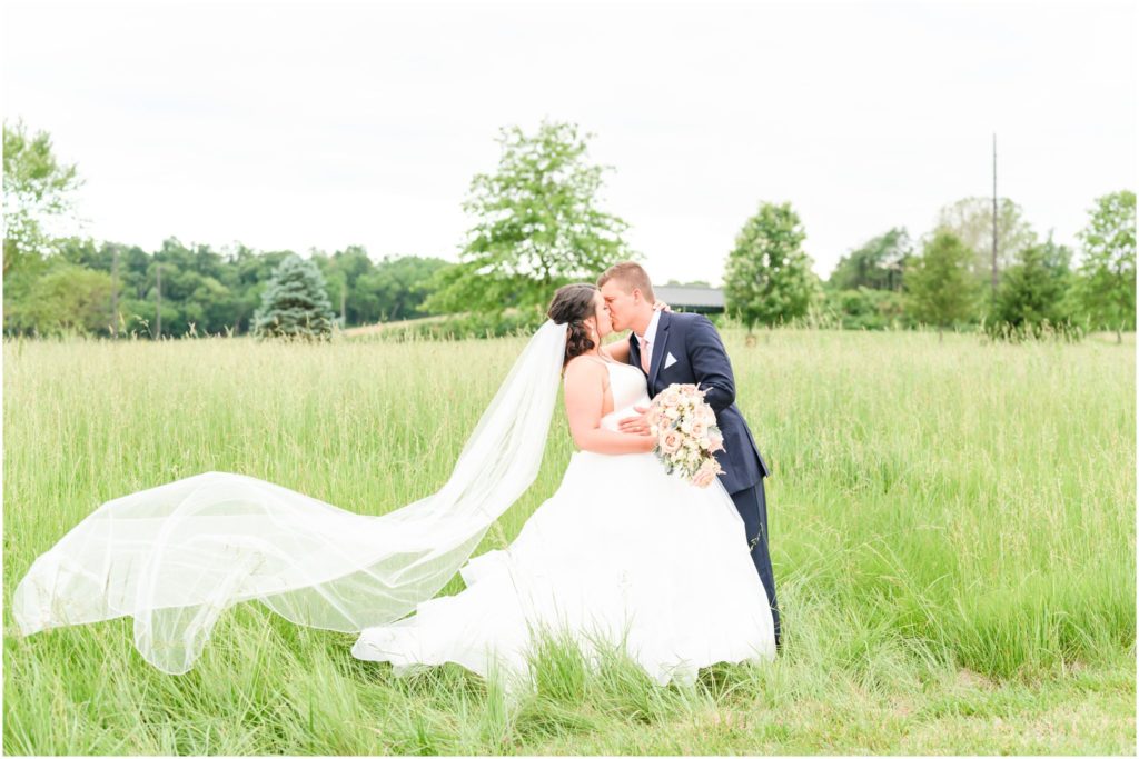 Veil toss kiss Loogootee Indiana summer wedding