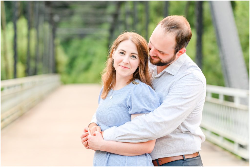 Couple nuzzling Charlestown State Park engagement session