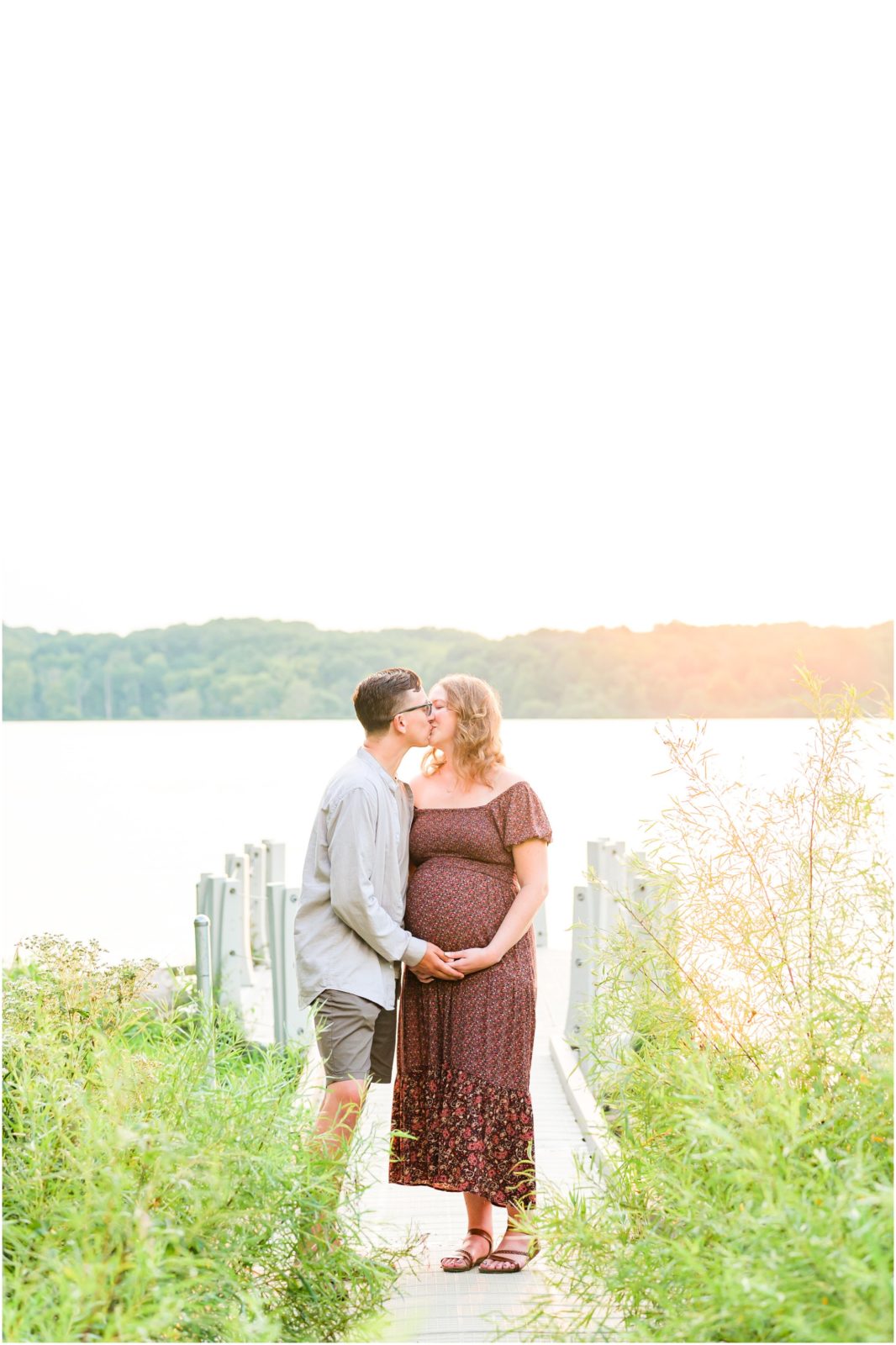 Kiss and cradle baby bump Eagle Creek Park maternity session