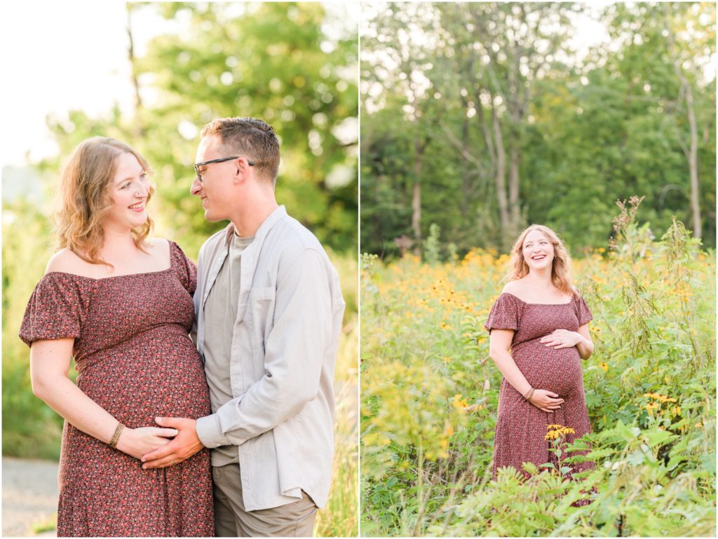 Mom cradling baby bump and laughing Eagle Creek Park maternity session
