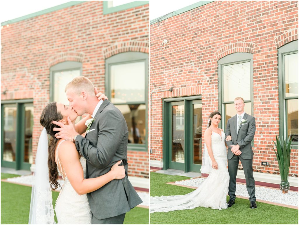 Bride and groom kiss Mavris Arts & Event Center Wedding
