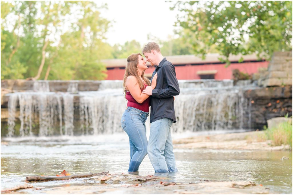 Nose to nose in water Cataract Falls engagement session