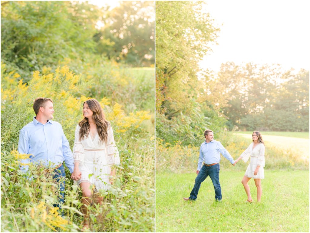 Couple walking through field holding hands New Castle Indiana engagement session