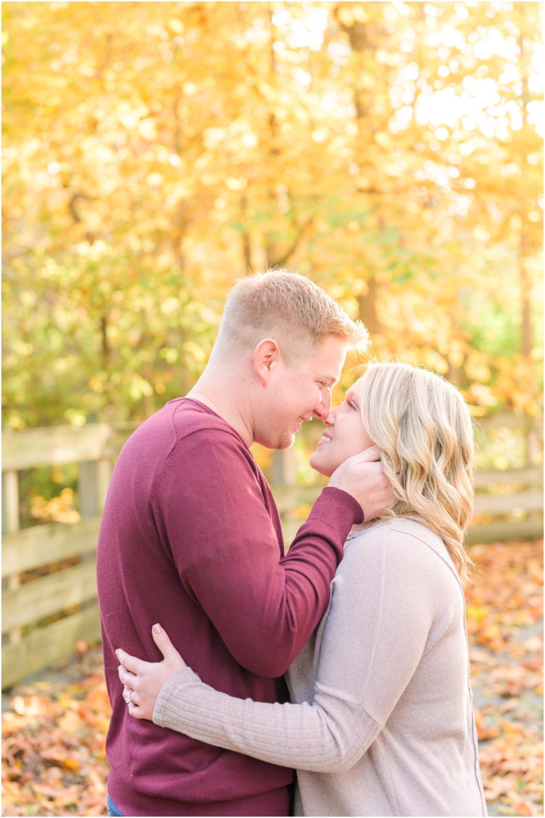 Couple smiling nose to nose Eagle Creek Park engagement session