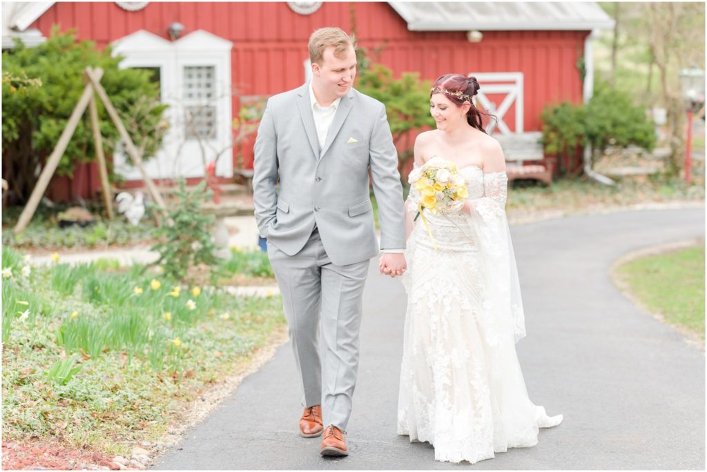 Bride and groom walking Red Barn Acres Wedding