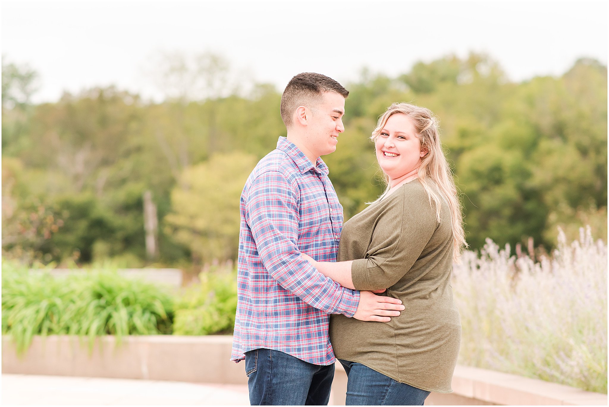 Couple smiling during Beckley Creek Park engagement session