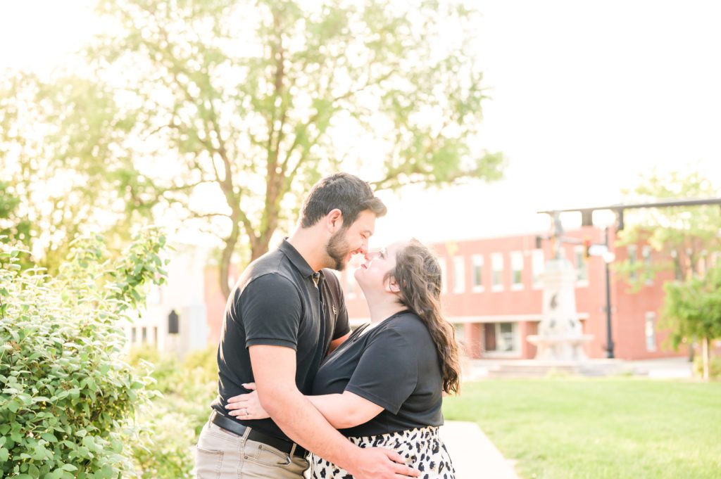 Couple nose to nose Downtown Franklin, Indiana engagement session