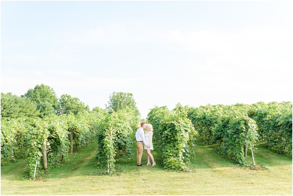 Couple kissing Oliver Winery engagement session