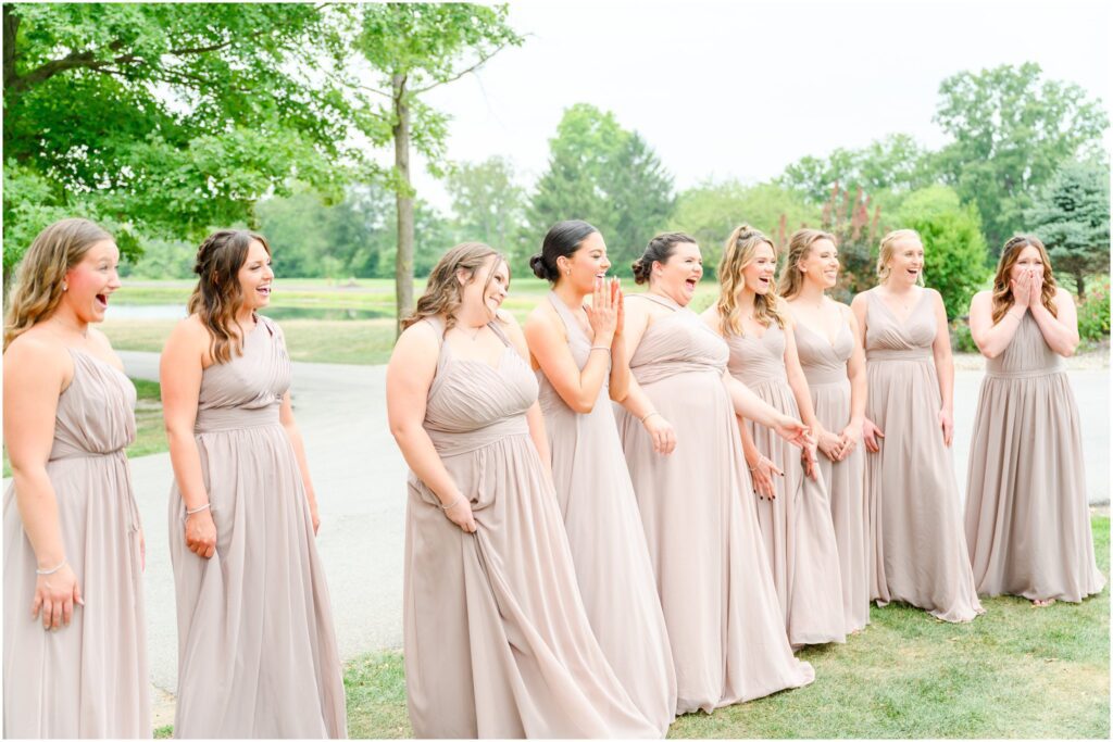 First Look with bridesmaids The Cardinal room wedding