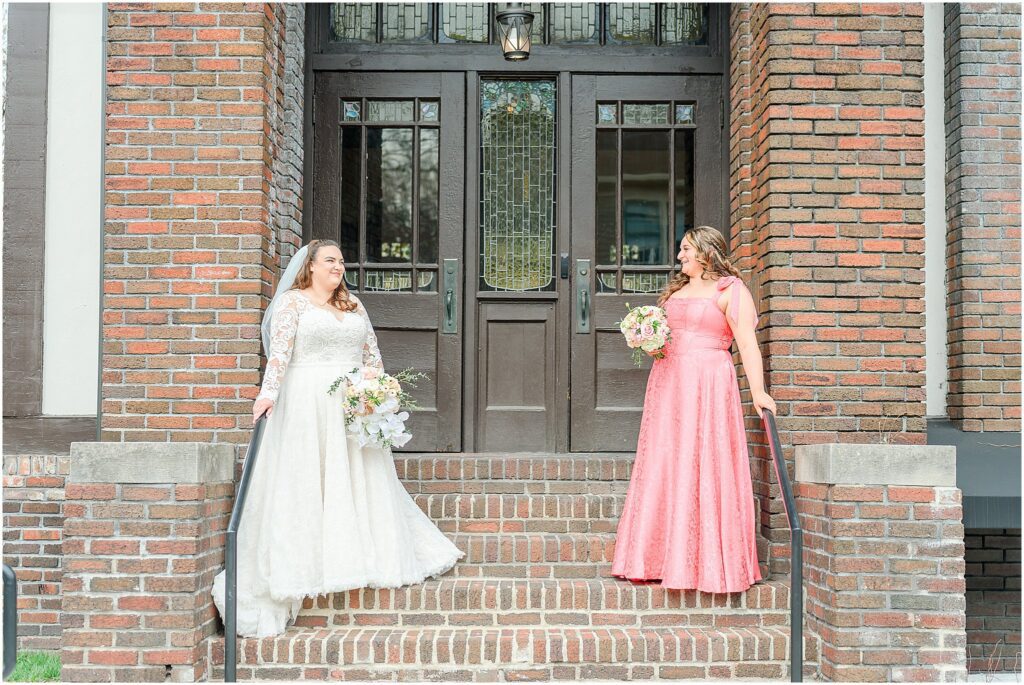 Wedding party photos at The Estuary Indianapolis with bride, groom, and their closest friends celebrating in an intimate indoor setting