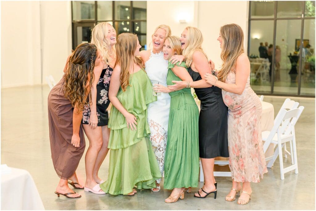 Guests enjoying dinner and speeches at an Indianapolis rehearsal dinner